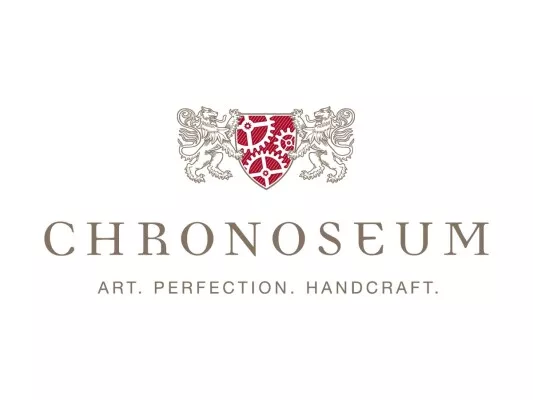 The Chronoseum logo: two stylized lions frame a coat of arms with clockwork from the right and left. Below it in capital letters CHRONOSEUM with the subtitle “ART. PERFECTION. HANDCRAFT.” 
