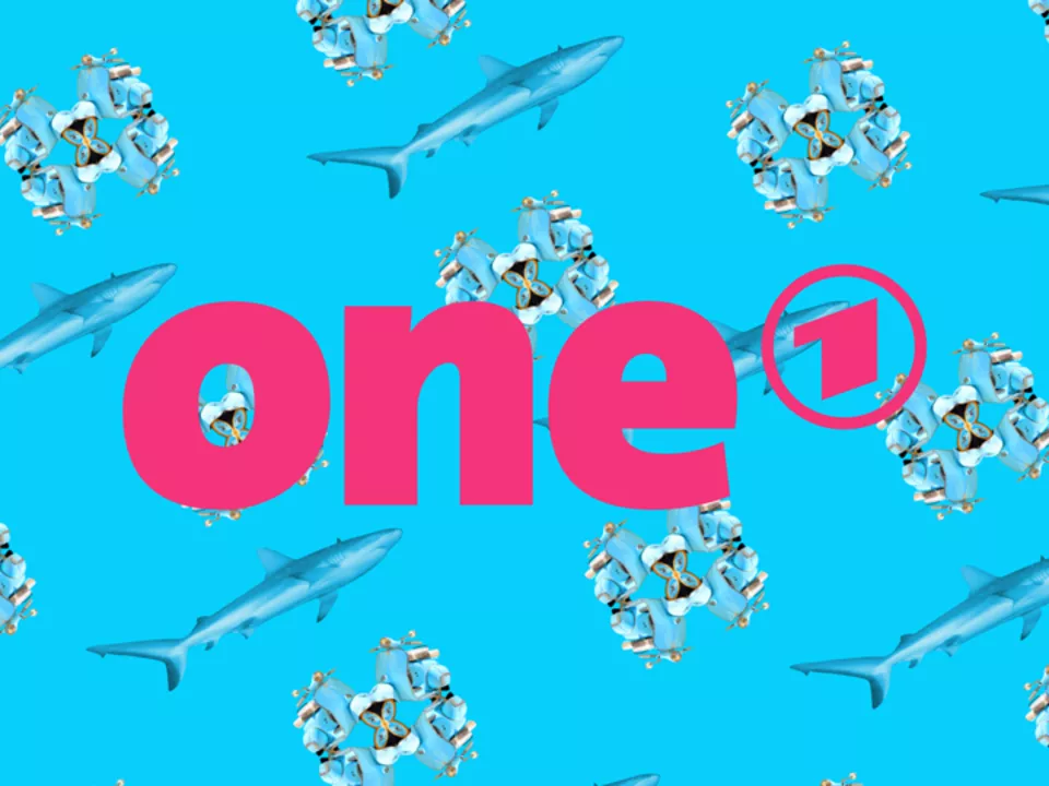 The image shows the pink ONE logo on a blue background with sharks and flowers. 